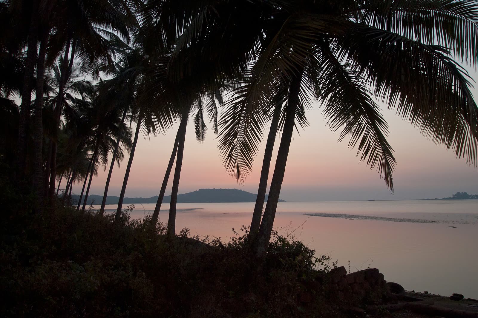 Goa coastline at sunset near Vagator and Chapora bay